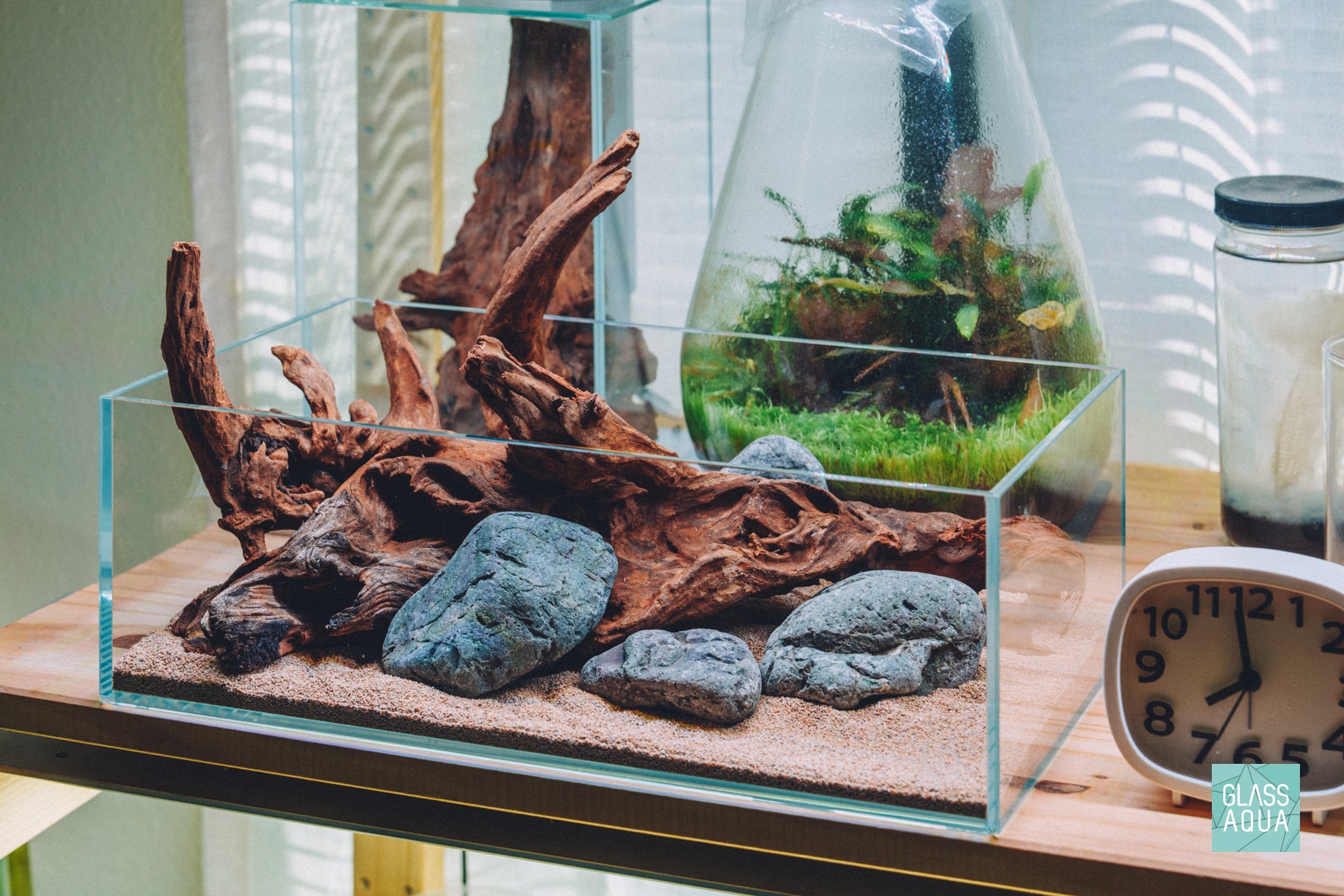 Small UNS 5S shallow aquarium with driftwood and rocks