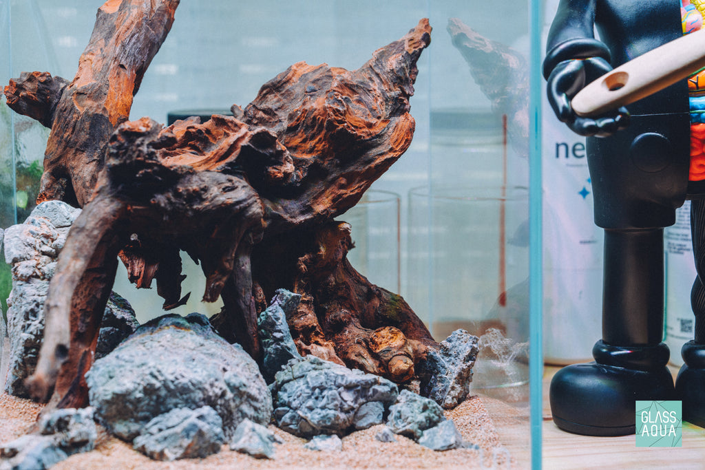 Detail photo of natural driftwood and stone in Quick Scape 159